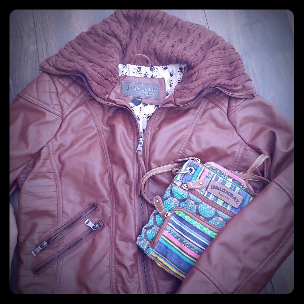 Brown leather jacket with owl shoulder bag